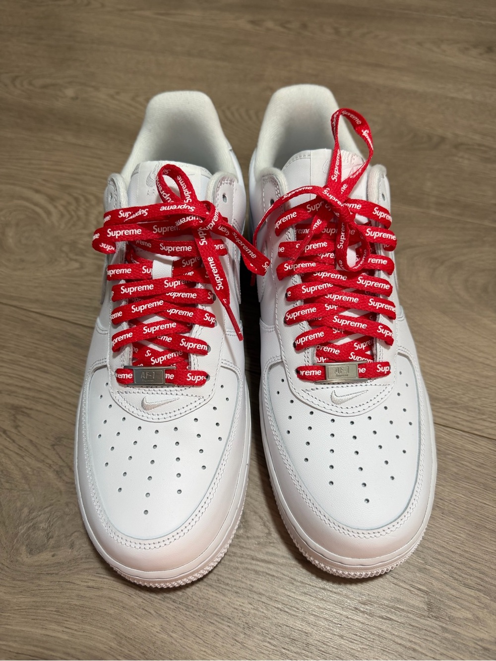 Nike & Supreme Men’s Air Force 1 Low SP White Sneakers with Red Supreme Laces